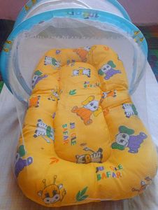 Baby bed with mosquito net