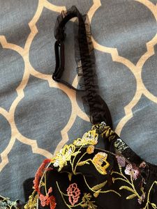 Elegant embroidered net corset.