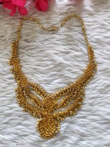 Women Golden Stone Studded Jewellery Sets