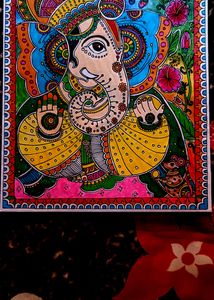 Homemade Lord Ganesha. Madhubhani Painting. Water,