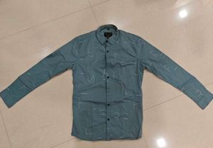 Avan Paul Printed Teal Green Casual Shirt (Medium)