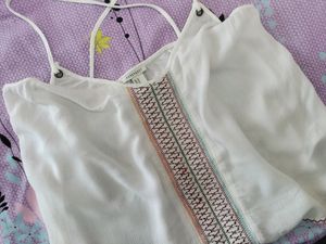 sleeveless top ,bust size-36,goes well on jeans and skirts