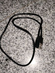 Sleek Black Smartwatch With Usb Charge Cable