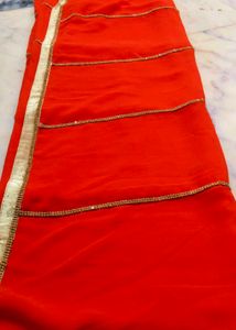 Orange Saree with Gold Dimond Patti Border