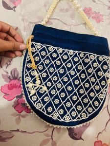 Elegant Heavy Blue Pearl Potli Bag with Tassels