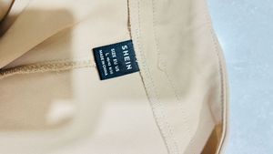 Tan Flared Leg Trousers