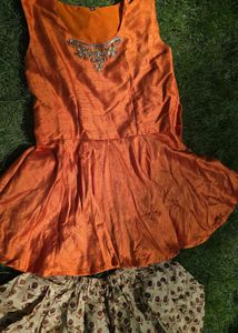 modern pulm top and dhoti along with shrug