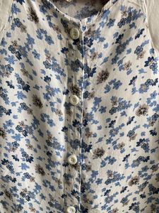Beautiful Sleeveless White Button Down Shirt