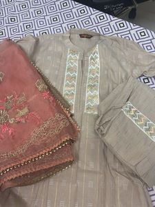 Elegant Beige Embroidered Salwar Kameez