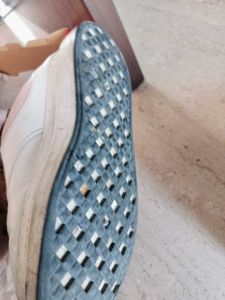good white color sneaker shoes