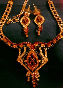 Diamond Necklace In Multi Color With Earning. ..