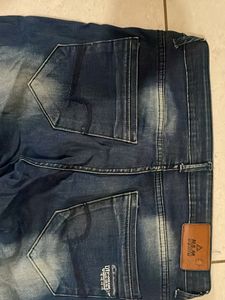 Distressed Denim Jeans