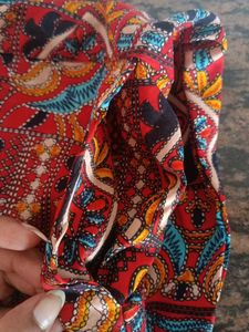 Patterned Sleeveless Jumpsuit with Belt