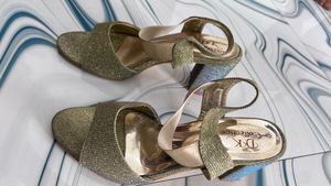Gold Heels never used new