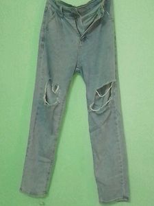 Ripped Knee Jeans