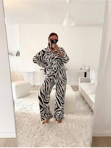 H&M Zebra Print Flare Trouser Pants