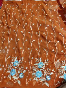 Beautiful Design Light Rust Color Saree