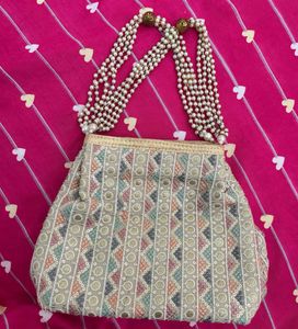 Graceful Ethnic Clutch With Embroidery