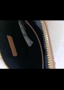 Nude Mango Sling Bag