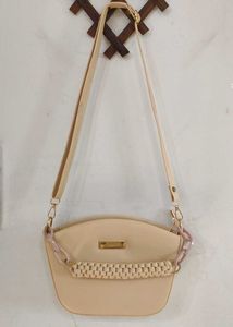 Beige Crossbody Bag with Chain Detail