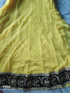 yellow net suit.