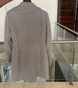 madame’s ice blue overcoat