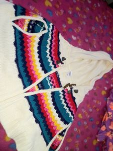 White With Colourful Poncho