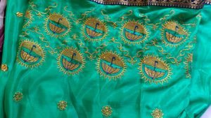 Green Colour Saree With Blue Border
