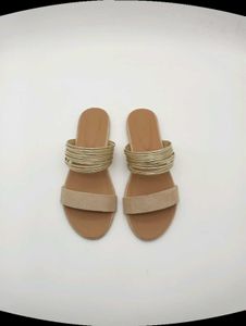 Tan And Gold Flat Sandals.