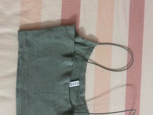 green tank top