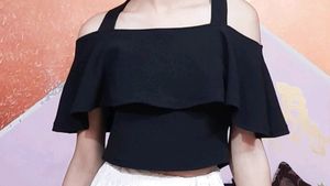 black half shoulder top
