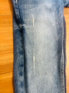 Distressed Slim Fit Jeans