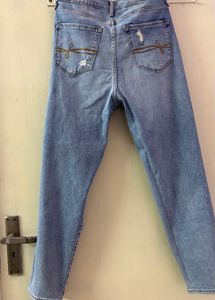 Ripped High-Waisted Jeans
