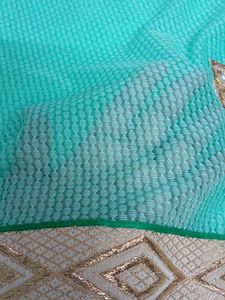 Elegant Teal Saree with Gold Embroidery