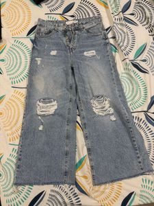 2 Pair Of Ripped Wide Leg And Straight Jeans