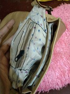 Beauty Handbag torn inside