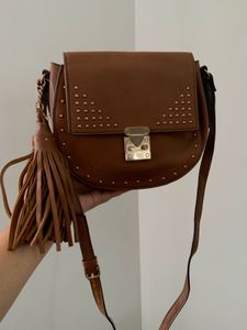Faux leather saddle bag with stud