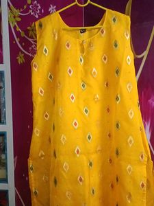 New Yellow Kurta with attached sleeves