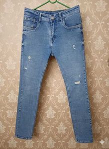 Distressed Denim Jeans