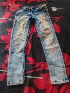 Ripped Blue Denim Jeans