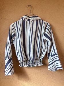 White Top With The Blue Strips On It