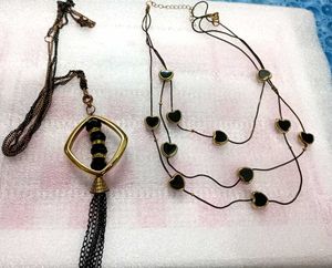 Long Neck Piece And Black Earrings