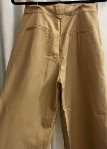 Beige flared parallel Trousers