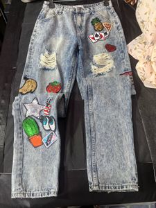 Ripped &amp; Patched Wide Leg Jeans