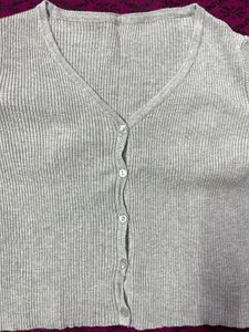 grey long sleeve buttoned top