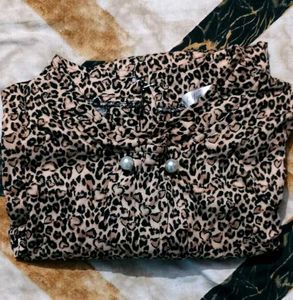 leopard-print top with pearl buttons