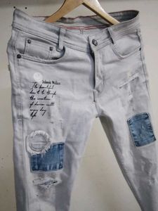 Distressed Denim Jeans