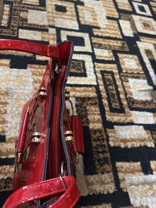 Red Handbag with Floral Detail
