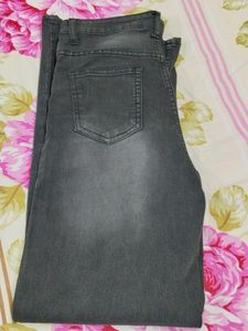 Black Jeans With Faded Pattern On Front