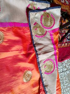 Elegant Orange Embroidered Saree